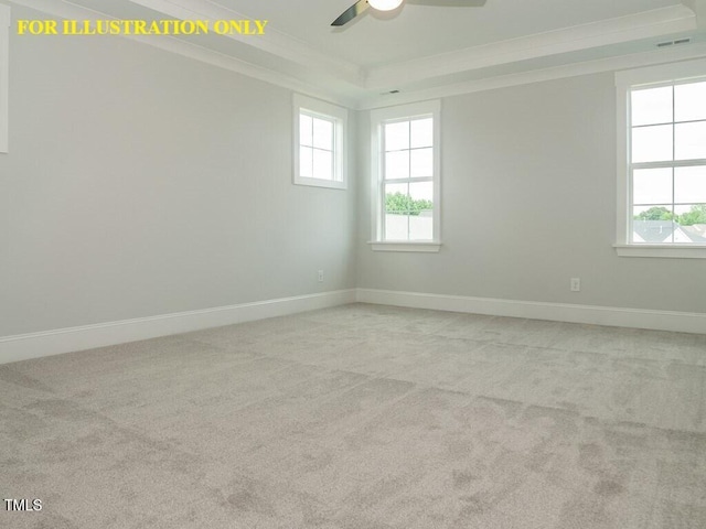 spare room with crown molding, ceiling fan, a tray ceiling, light carpet, and baseboards