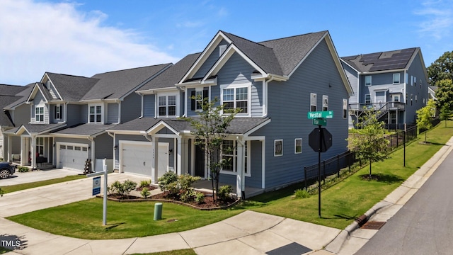6624 Vestal St, Wake Forest, NC 27587 - view of front facade with concrete driveway, a residential view, a garage, and a shingled roof