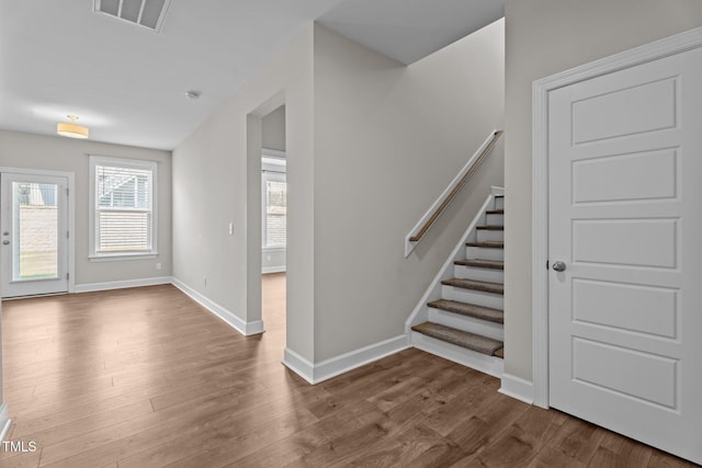 6624 Vestal St, Wake Forest, NC 27587 - stairs featuring wood finished floors and baseboards