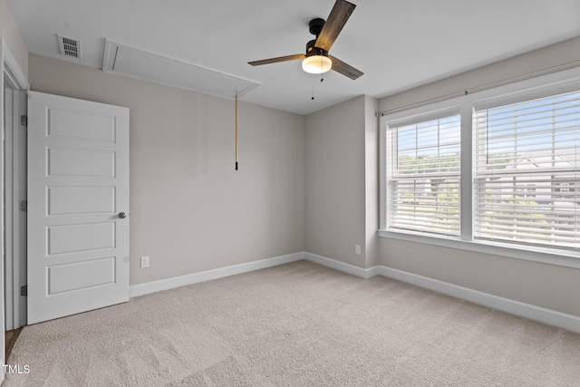 6624 Vestal St, Wake Forest, NC 27587 - carpeted empty room with attic access, a ceiling fan, and baseboards