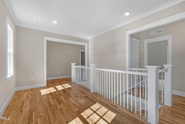 1029 Whitehall Cir, Durham, NC 27713 - empty room with ornamental molding, baseboards, wood finished floors, and recessed lighting