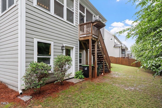 213 Preatonwood Dr, Apex, NC 27539 - back of property featuring stairs and a deck