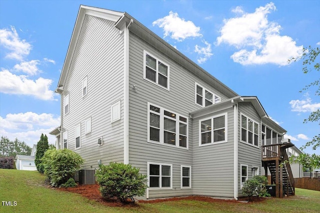 213 Preatonwood Dr, Apex, NC 27539 - back of house featuring stairway, central AC, a yard, and a deck
