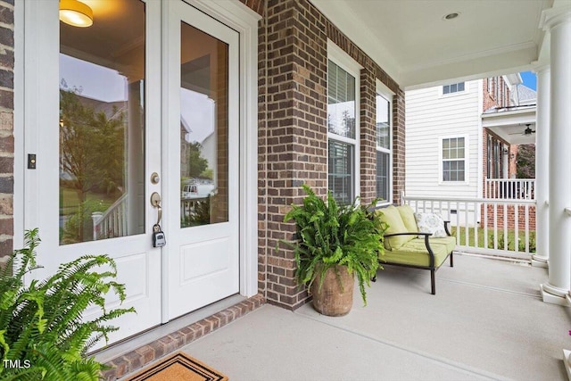 213 Preatonwood Dr, Apex, NC 27539 - property entrance featuring a porch and brick siding