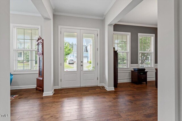 213 Preatonwood Dr, Apex, NC 27539 - entrance foyer with french doors, hardwood / wood-style flooring, healthy amount of natural light, and ornamental molding