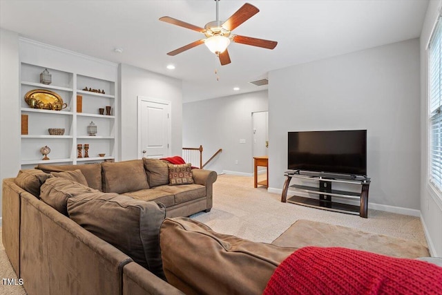 213 Preatonwood Dr, Apex, NC 27539 - living room featuring light colored carpet, a ceiling fan, baseboards, recessed lighting, and healthy amount of natural light