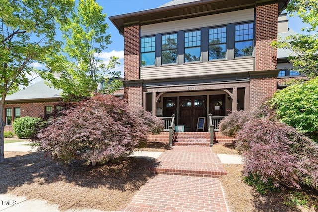 213 Preatonwood Dr, Apex, NC 27539 - view of front of property with brick siding and covered porch