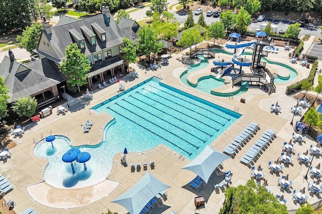 213 Preatonwood Dr, Apex, NC 27539 - view of swimming pool featuring a water play area and a water slide