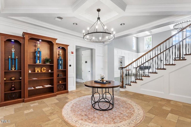 213 Preatonwood Dr, Apex, NC 27539 - entryway with stone tile flooring, a chandelier, stairs, coffered ceiling, and crown molding