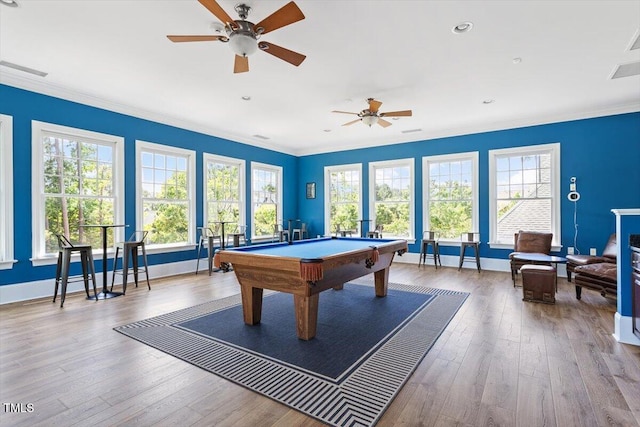 213 Preatonwood Dr, Apex, NC 27539 - playroom featuring ornamental molding, hardwood / wood-style floors, billiards, a ceiling fan, and plenty of natural light