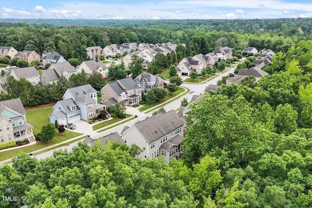 213 Preatonwood Dr, Apex, NC 27539 - aerial perspective of suburban area with a heavily wooded area