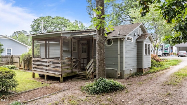 205 W Oak Ave, Wake Forest, NC 27587 - view of front facade with a deck and a shingled roof