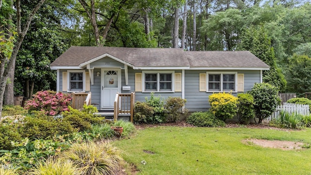 205 W Oak Ave, Wake Forest, NC 27587 - view of front of home with a shingled roof