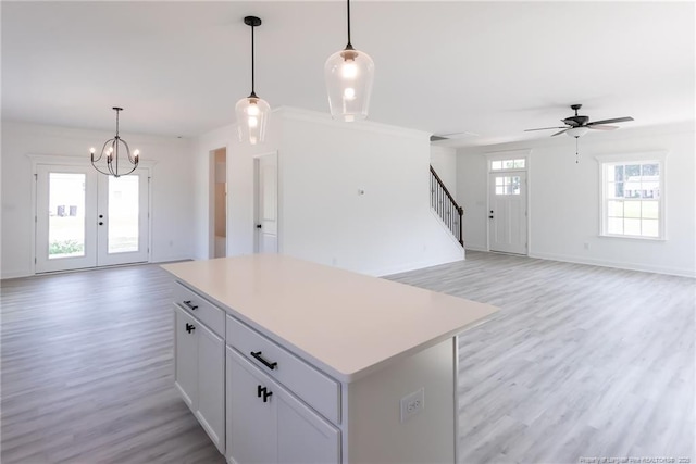 00 John B Carter Rd, Fayetteville, NC 28312 - kitchen featuring open floor plan, a kitchen island, light wood finished floors, and light countertops
