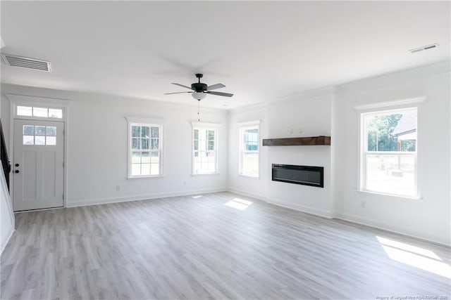 00 John B Carter Rd, Fayetteville, NC 28312 - unfurnished living room with healthy amount of natural light and light wood-type flooring