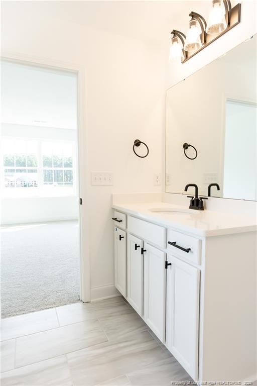00 John B Carter Rd, Fayetteville, NC 28312 - bathroom with vanity, tile patterned flooring, and baseboards