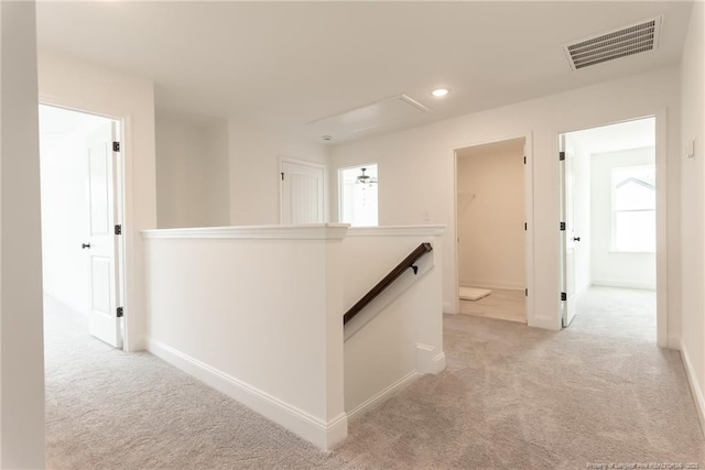 00 John B Carter Rd, Fayetteville, NC 28312 - hallway with an upstairs landing, light colored carpet, recessed lighting, and baseboards