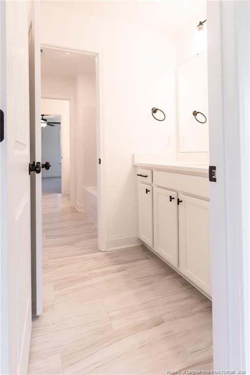 00 John B Carter Rd, Fayetteville, NC 28312 - bathroom featuring baseboards and vanity