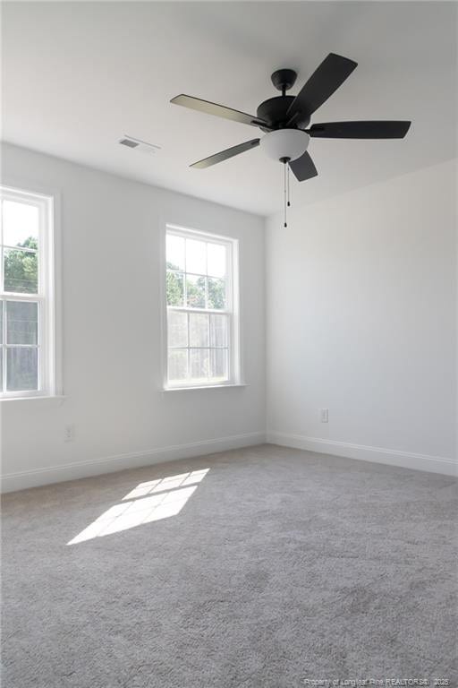 00 John B Carter Rd, Fayetteville, NC 28312 - carpeted spare room featuring baseboards