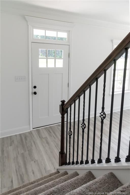 00 John B Carter Rd, Fayetteville, NC 28312 - foyer featuring light wood-type flooring, stairway, and baseboards