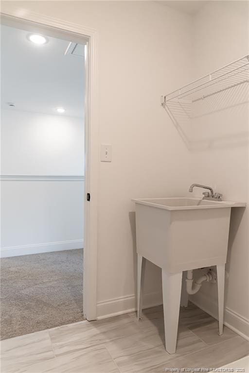 00 John B Carter Rd, Fayetteville, NC 28312 - laundry room featuring baseboards and a sink