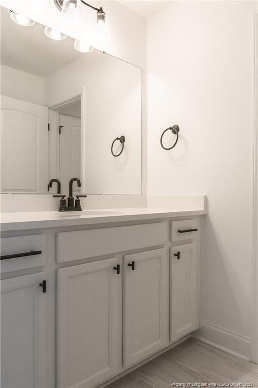 00 John B Carter Rd, Fayetteville, NC 28312 - bathroom with vanity and baseboards