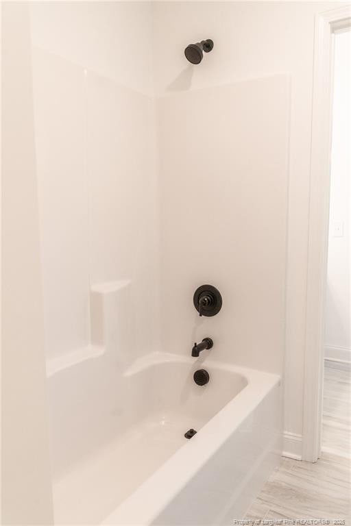 00 John B Carter Rd, Fayetteville, NC 28312 - bathroom with baseboards and washtub / shower combination