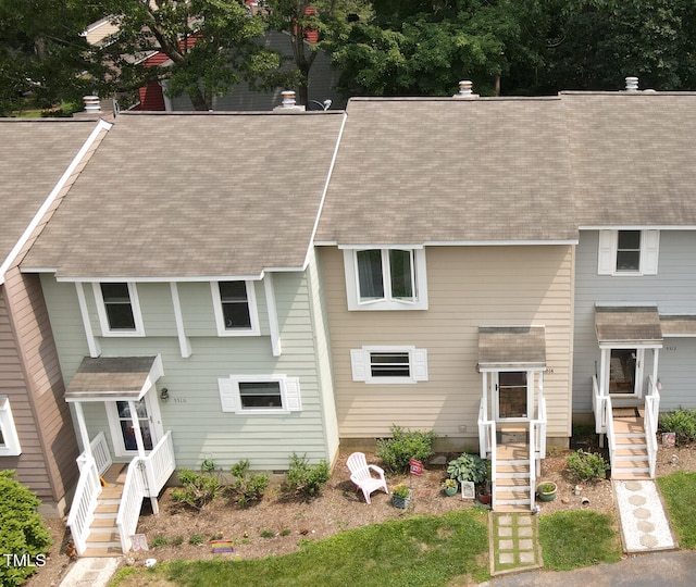 5514 Oldtowne Rd, Raleigh, NC 27612 - view of front facade with a shingled roof and stairway