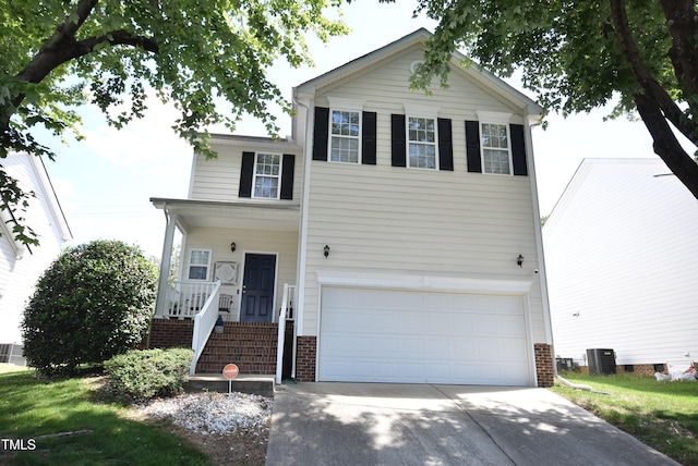 109 Troyer Pl, Apex, NC 27502 - view of front of house featuring an attached garage, concrete driveway, cooling unit, and brick siding