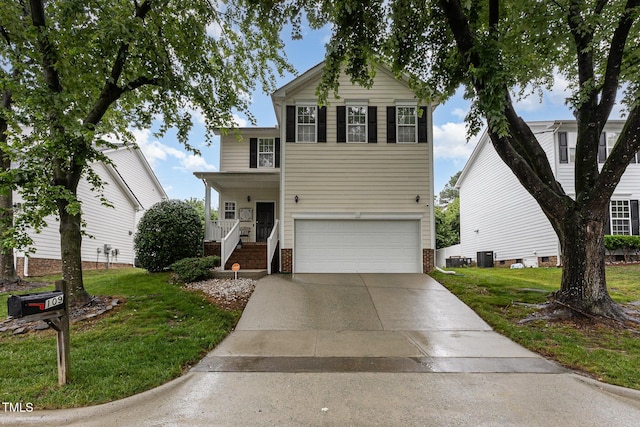 109 Troyer Pl, Apex, NC 27502 - traditional home featuring an attached garage, a front yard, driveway, and brick siding
