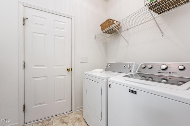 109 Troyer Pl, Apex, NC 27502 - washroom featuring washing machine and clothes dryer and light tile patterned flooring