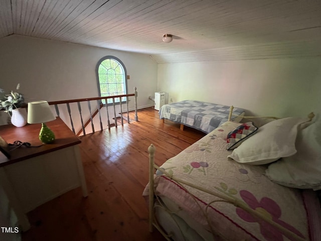 358 Pool Rock Shores Ln, Henderson, NC 27537 - bedroom with vaulted ceiling, wood finished floors, and wooden ceiling