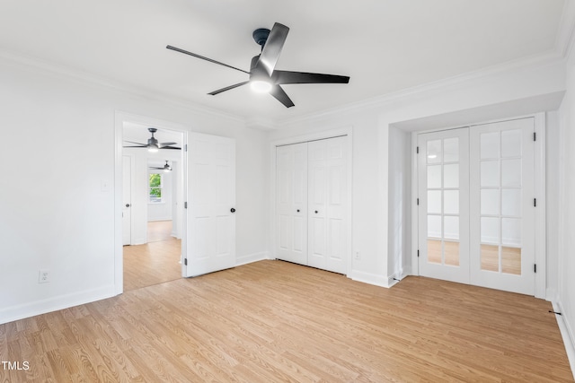 2205 Landings Way, Raleigh, NC 27615 - unfurnished bedroom with light wood-type flooring, ornamental molding, baseboards, and a ceiling fan