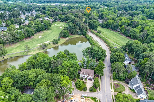 2205 Landings Way, Raleigh, NC 27615 - aerial view of property's location with a nearby body of water, a golf course, and a tree filled landscape