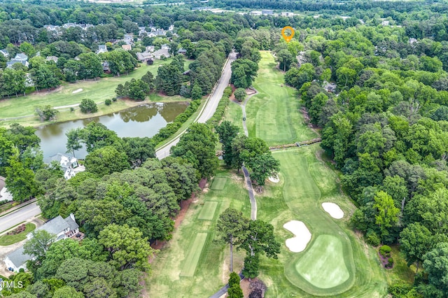 2205 Landings Way, Raleigh, NC 27615 - aerial view of property and surrounding area with a nearby body of water, a golf course, and a tree filled landscape