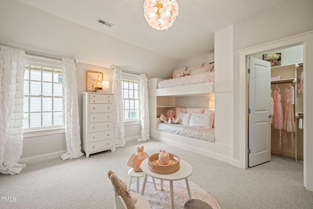 129 Ruskin Dr, Chapel Hill, NC 27516 - carpeted bedroom featuring lofted ceiling, baseboards, and a spacious closet