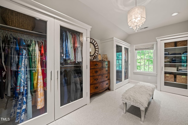 129 Ruskin Dr, Chapel Hill, NC 27516 - carpeted bedroom featuring french doors, a chandelier, access to exterior, vaulted ceiling, and recessed lighting