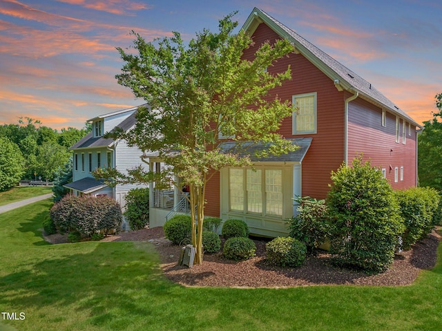 129 Ruskin Dr, Chapel Hill, NC 27516 - view of front of home with a lawn