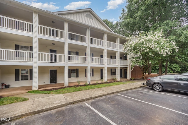 1851 Trailwood Heights Ln Unit 204, Raleigh, NC 27603 - view of property with uncovered parking
