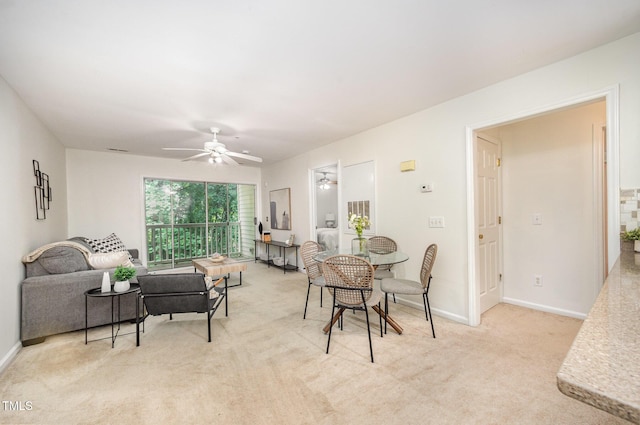 1851 Trailwood Heights Ln Unit 204, Raleigh, NC 27603 - carpeted dining area featuring ceiling fan and baseboards