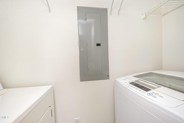 1851 Trailwood Heights Ln Unit 204, Raleigh, NC 27603 - laundry room featuring electric panel and washer and clothes dryer