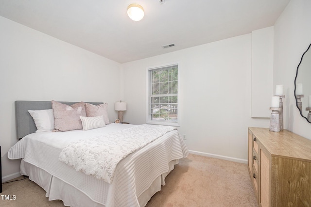 1851 Trailwood Heights Ln Unit 204, Raleigh, NC 27603 - bedroom featuring light carpet and baseboards