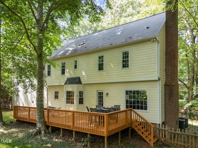 2840 Mattlyn Ct, Raleigh, NC 27613 - back of house featuring a chimney, a wooden deck, and outdoor lounge area
