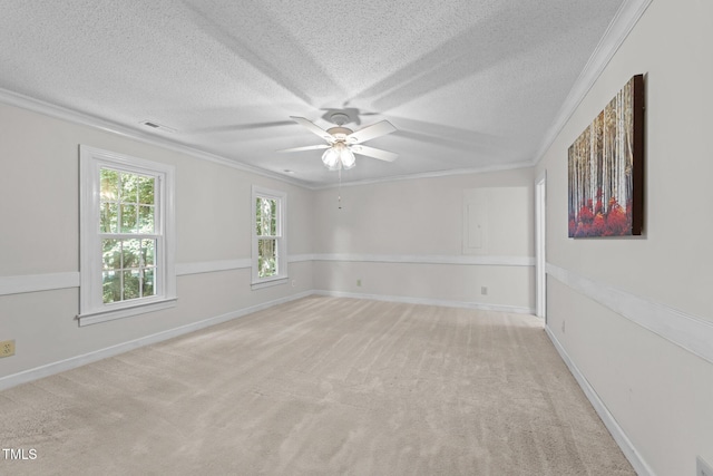 2840 Mattlyn Ct, Raleigh, NC 27613 - unfurnished room featuring a textured ceiling, crown molding, a ceiling fan, light carpet, and baseboards
