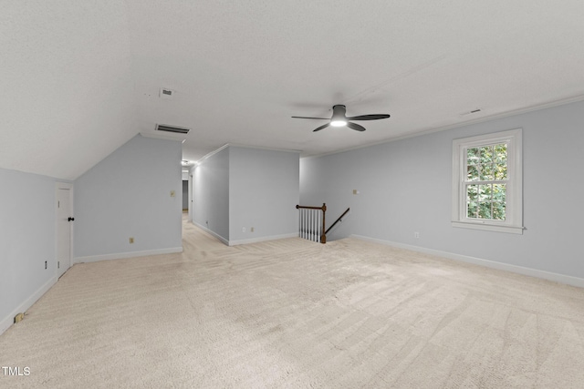 2840 Mattlyn Ct, Raleigh, NC 27613 - additional living space with a ceiling fan, light carpet, baseboards, and vaulted ceiling