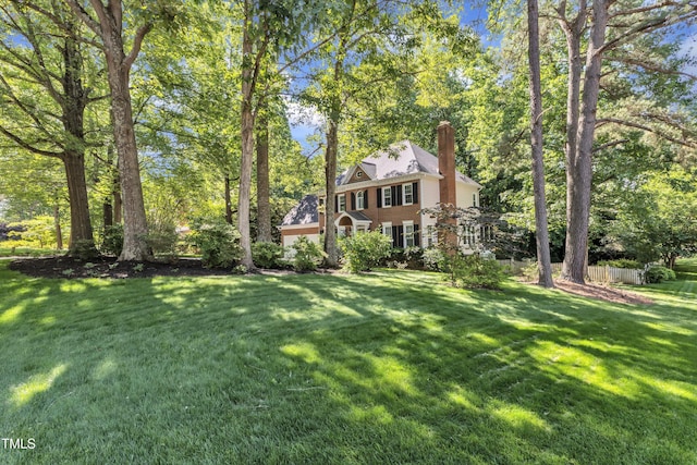 2125 Oakcrest Ct, Raleigh, NC 27612 - view of front of property featuring a chimney and a front lawn