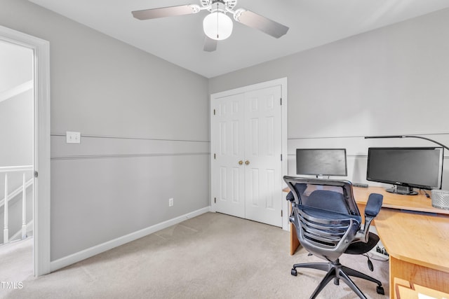2125 Oakcrest Ct, Raleigh, NC 27612 - home office with carpet floors, baseboards, and a ceiling fan
