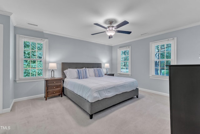 2125 Oakcrest Ct, Raleigh, NC 27612 - bedroom featuring baseboards, ornamental molding, light colored carpet, and a ceiling fan