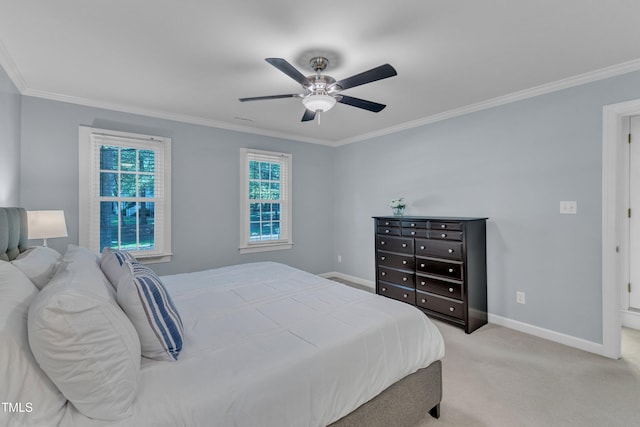 2125 Oakcrest Ct, Raleigh, NC 27612 - bedroom with crown molding, baseboards, light carpet, and a ceiling fan
