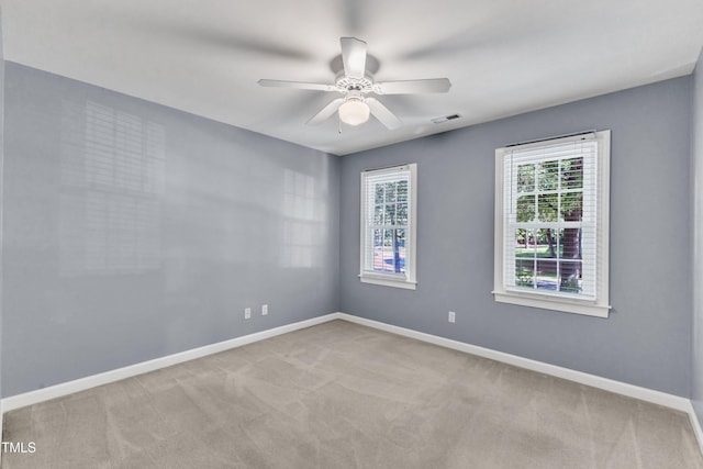 2125 Oakcrest Ct, Raleigh, NC 27612 - carpeted empty room with a ceiling fan and baseboards